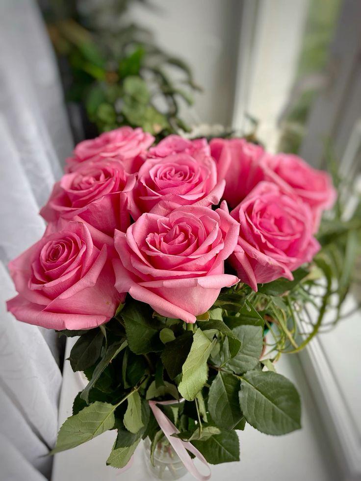 PlainLedgerPilot workshop space where corporate flower arrangements are designed and prepared for business delivery